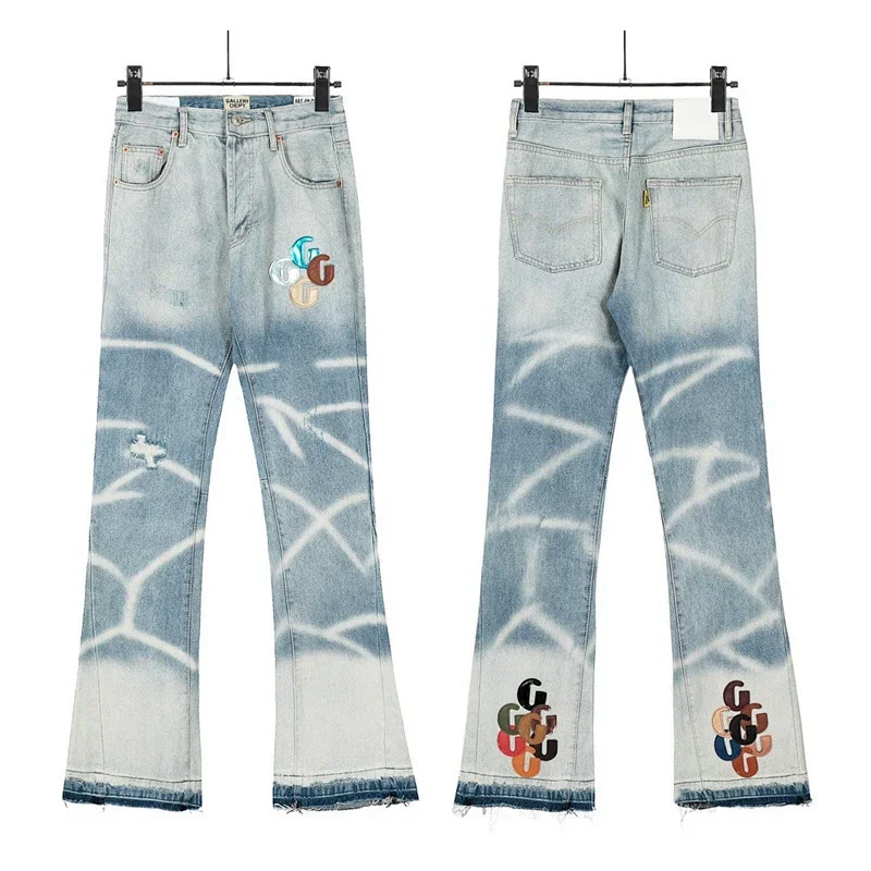 Gucci Light Blue Denim Jeans with Embroidered Double G Logos, Graffiti Print, Distressed & Frayed Flared Leg