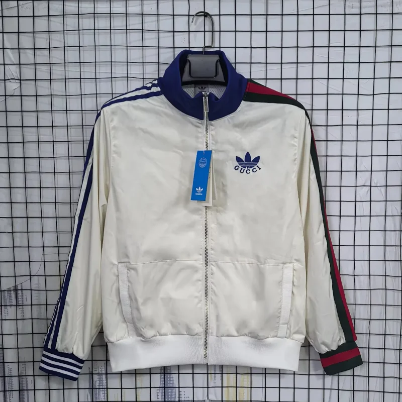 Corteiz White Track Jacket with Striped Sleeves, Zipper, Pockets & Trefoil Logo