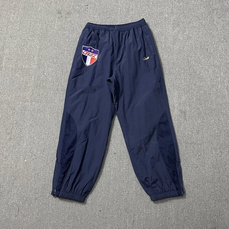 Cruz Navy Blue Mesh Panel Track Pants with Badge Logo & Elastic Cuffs