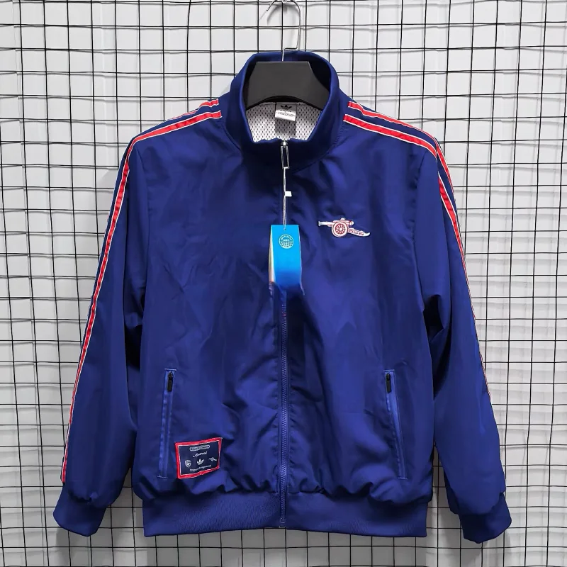 Corteiz Blue Track Jacket with Red Stripes, Zipper, Pockets & Arsenal Logo