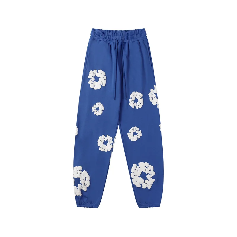 DENIM TEARS StreetStyle Blue Sweatpants with White Cloud - Like Ring Patterns